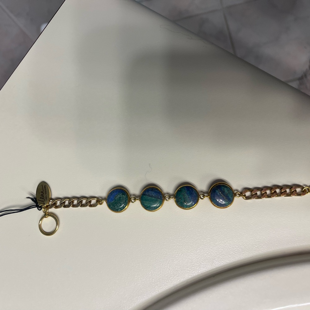 Lena Bernard design.  Pretty bracelet with blue/green stones.